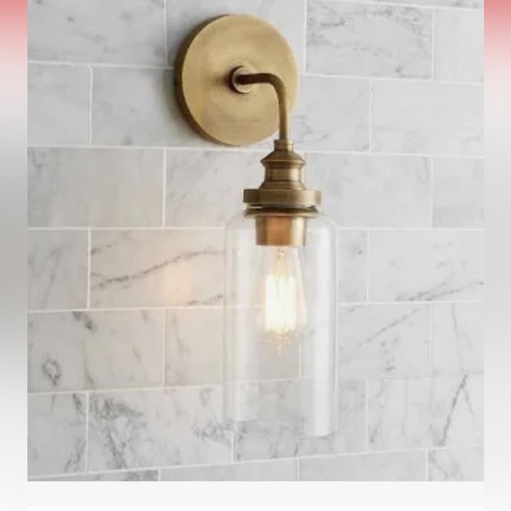 Pottery Barn sconce in bronze. Brand new in box.